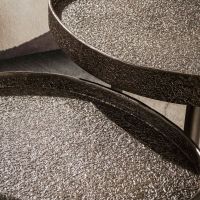 Fraaai Bas salontafel driehoekig set van 2 - brons metaal